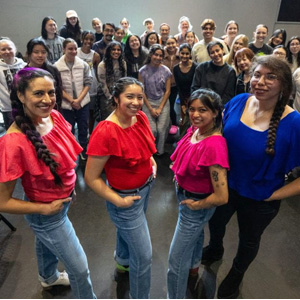 Vanessa Sanchez, Sandy Vazquez, Kirsten Millan and Tanya Benítez of La Mezcla pose with SJSU dance classes at the Hammer Theatre.