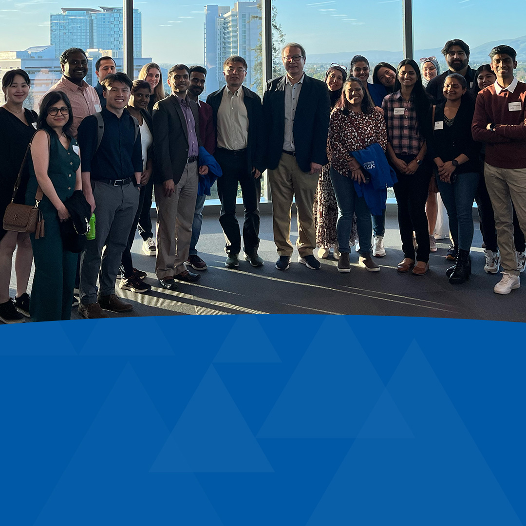 Applied Data Science Faculty, Staff, Students and Partners posing for a group photo at a department event