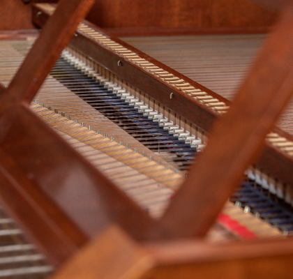 Close-up view of the inside of a historic keyboard instrument