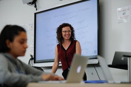 sjsu faculty member teaching with a smart board