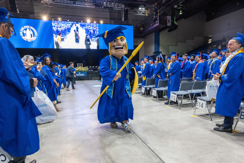 Sammy Spartan holding a spear