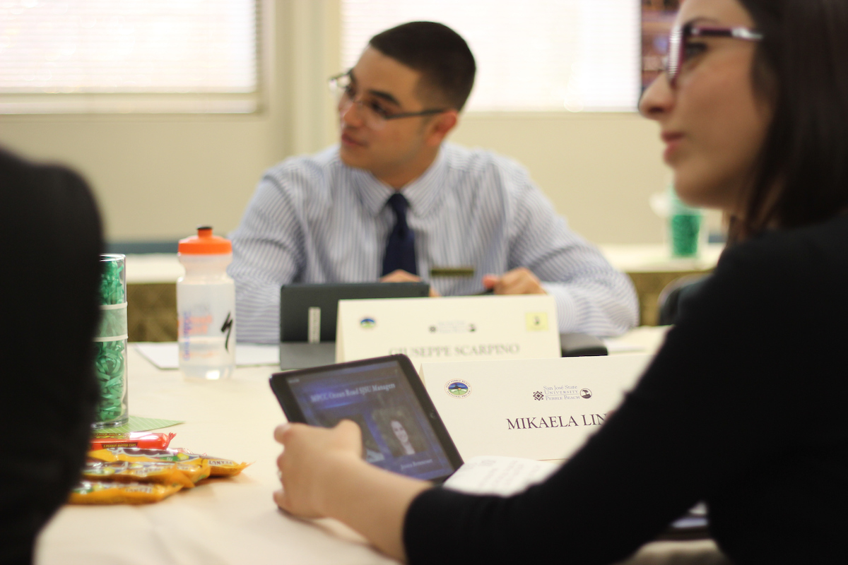 a group of students in a conference room