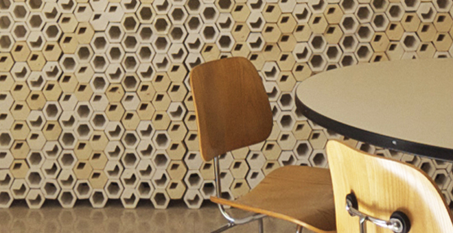 Chair in front of a honeycomb wall