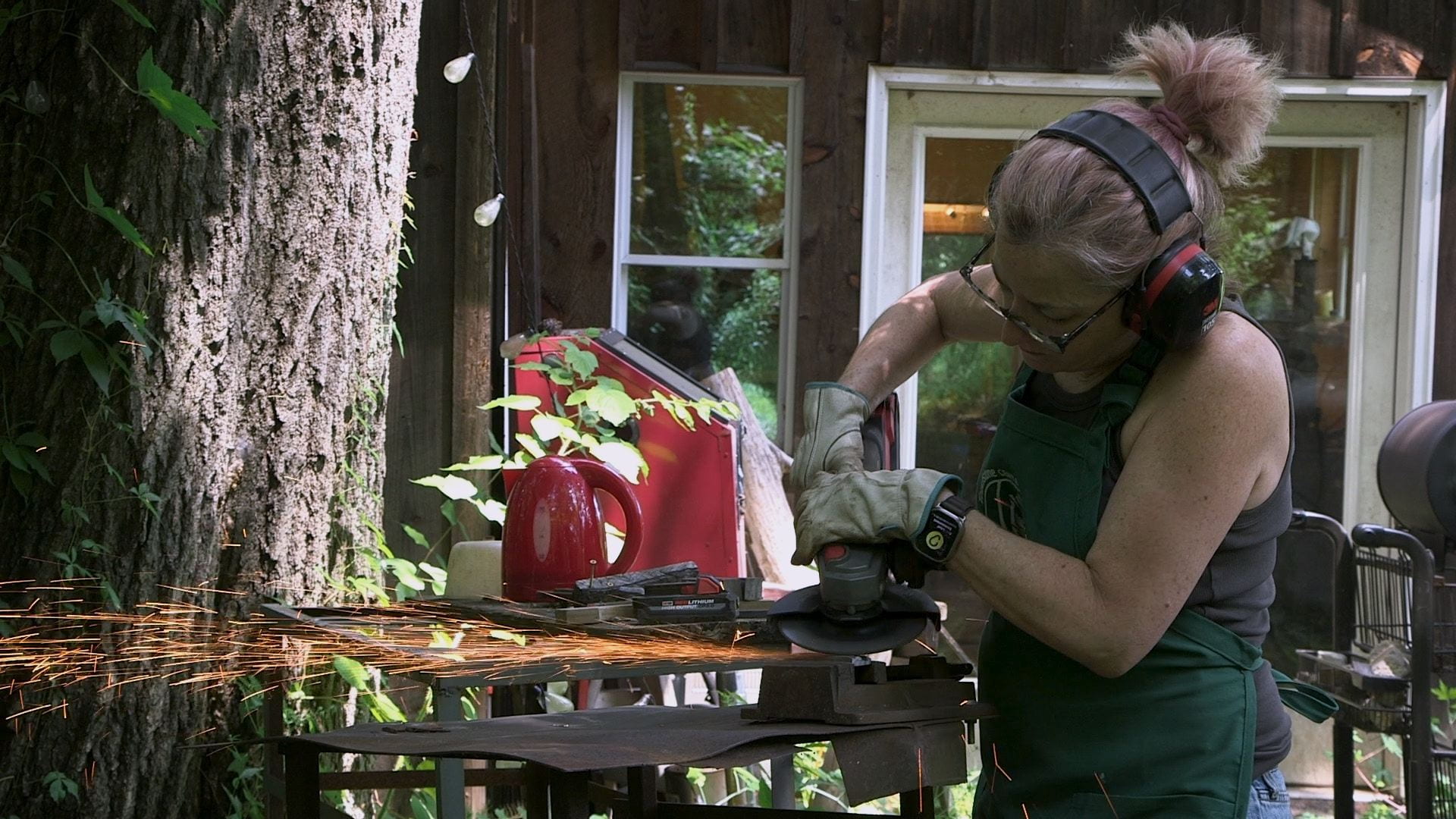 woman making jewelry