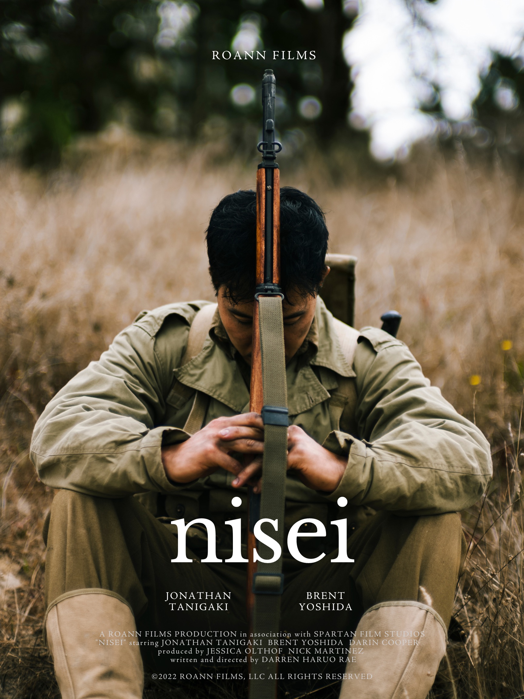young man with rifle poster for nisei short film
