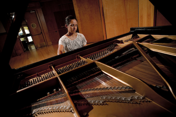 Female student playing the piano
