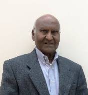 color headshot of Dr. Raghu Agarwal