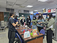 photo of students getting robotics demo at ot dept