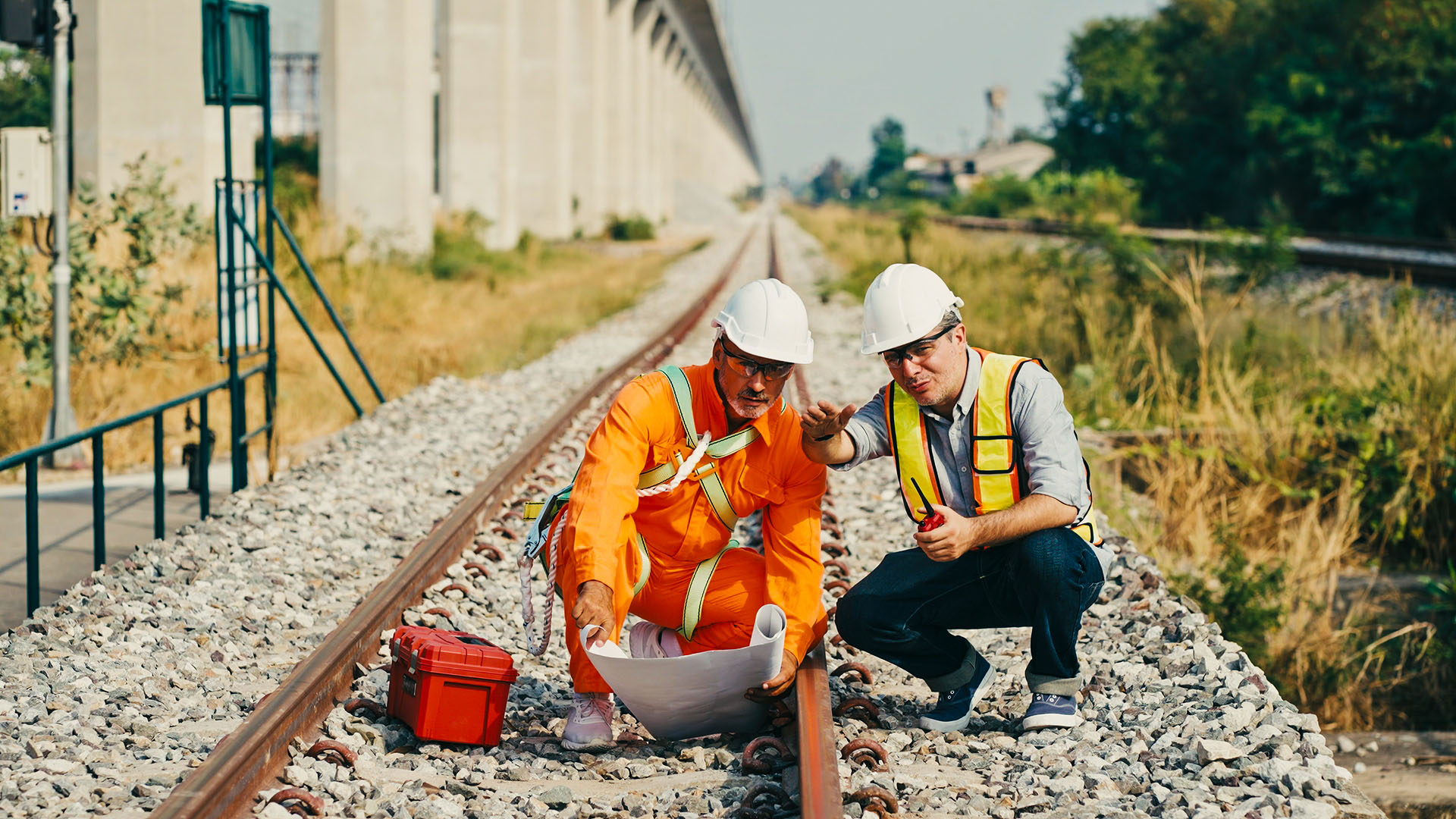 Railroad managers inspecting tracks