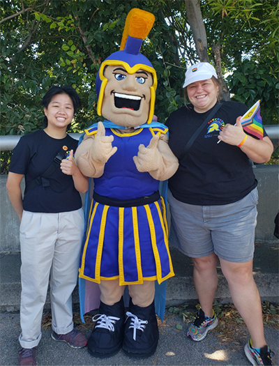 Photograph of oSTEM participants posing with the SJSU mascot Sammy Spartan.