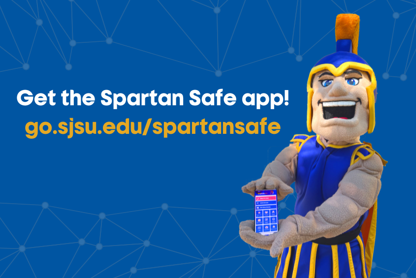 Sammy Spartan holding the Spartan Safe app open on a mobile phone