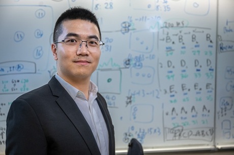 Dr. Gaojian Huang in the Lab