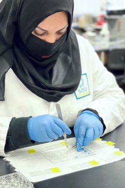 Female student in a lab