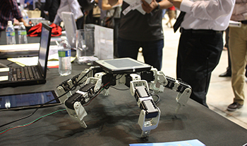 a robot or drone sits on a table