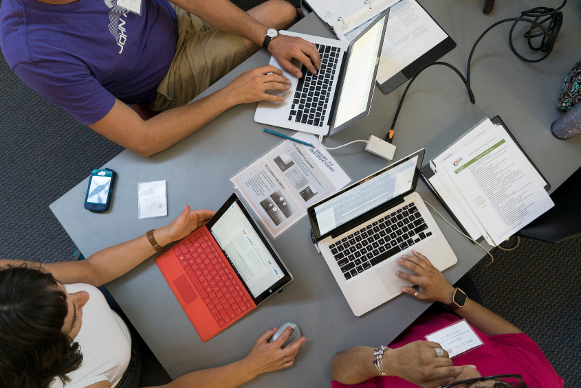 Stock photo of people on laptop computers.